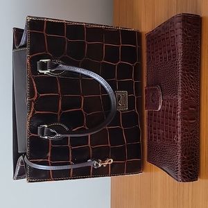 Designer's Dooney & Brooke hand bag with a free leather purse.